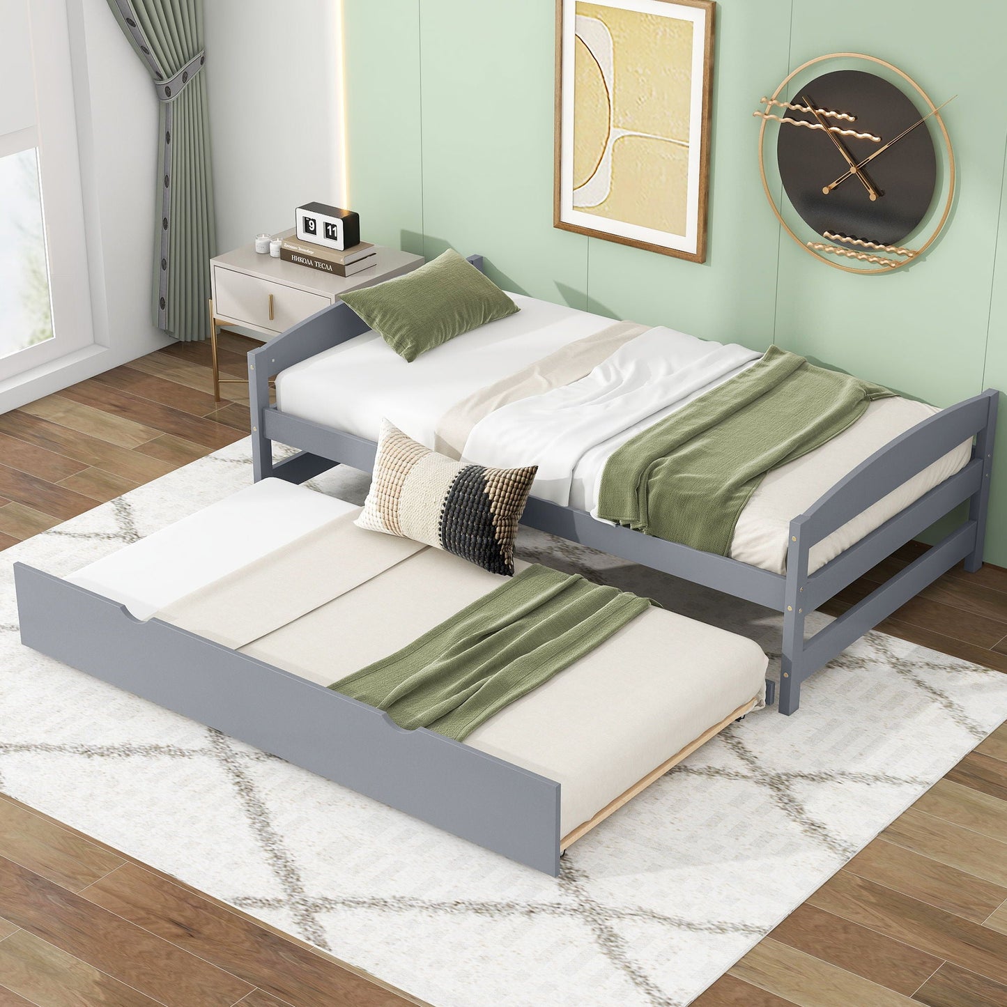 Platform beds with trundle, gray frames; two twin beds with green bedding on Tampa Home & Garden Store