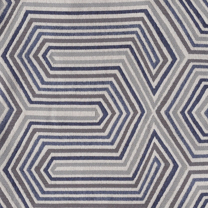 Area rug with blue gray concentric hexagonal geometric pattern and textured weave on Tampa Home & Garden Store