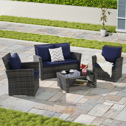 4-piece outdoor rattan furniture set with navy cushions and tempered glass coffee table on Tampa Home & Garden Store