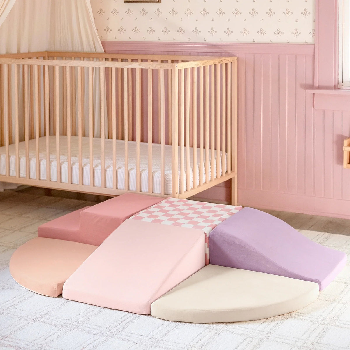 Tiny Land PlayNest Climbing Blocks violet foam play mats in a pastel nursery by Tiny Land INC on Tampa Home & Garden Store