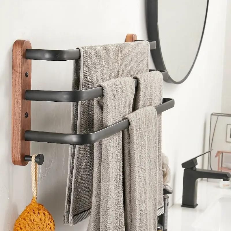 Solid wood wall-mounted towel rack with four black bars by FLIPSTYLEZLLC on Tampa Home & Garden Store