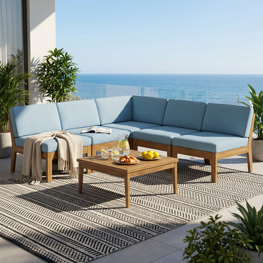 Grenada 5 Seater acacia wood sectional armless sofa set with blue cushions on a seaside patio on Tampa Home & Garden Store