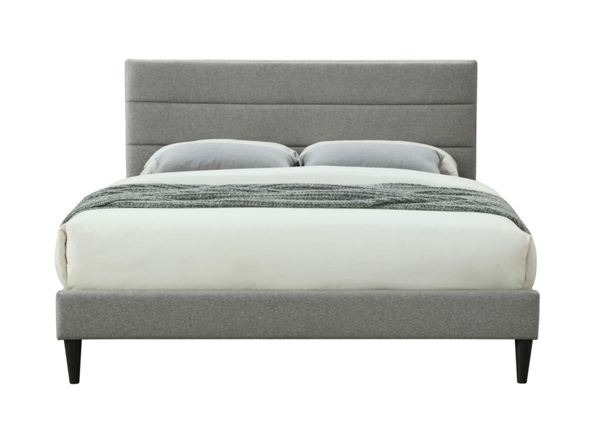Full Sized Channel Bed upholstered in gray fabric with a tall headboard and black tapered legs on Tampa Home & Garden Store