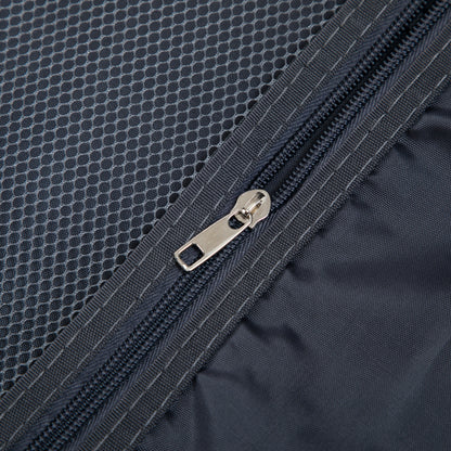 Luggage bag dark blue fabric close-up with metal zipper and honeycomb texture on Tampa Home & Garden Store