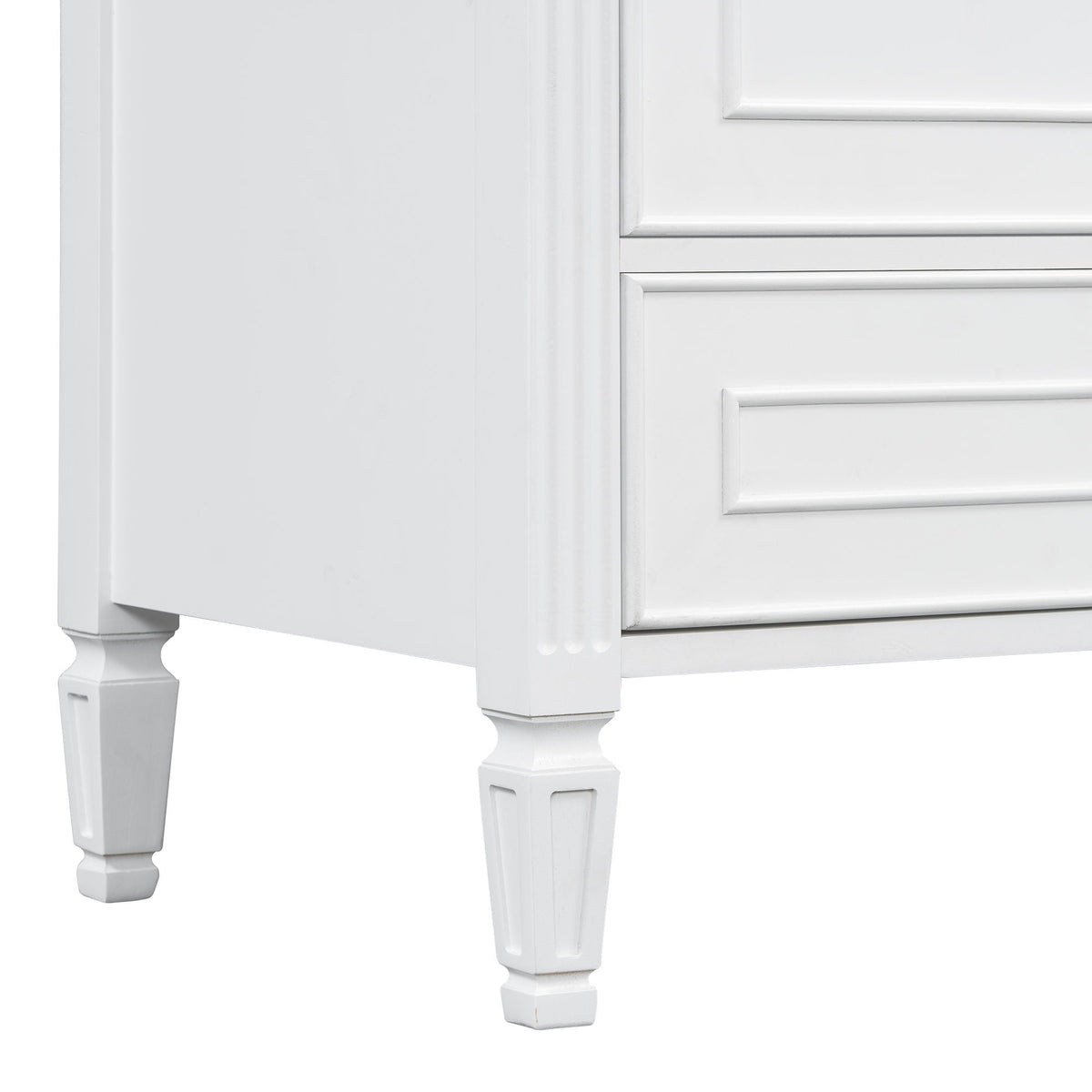 White freestanding vanity base with paneled drawers and turned legs on Tampa Home & Garden Store