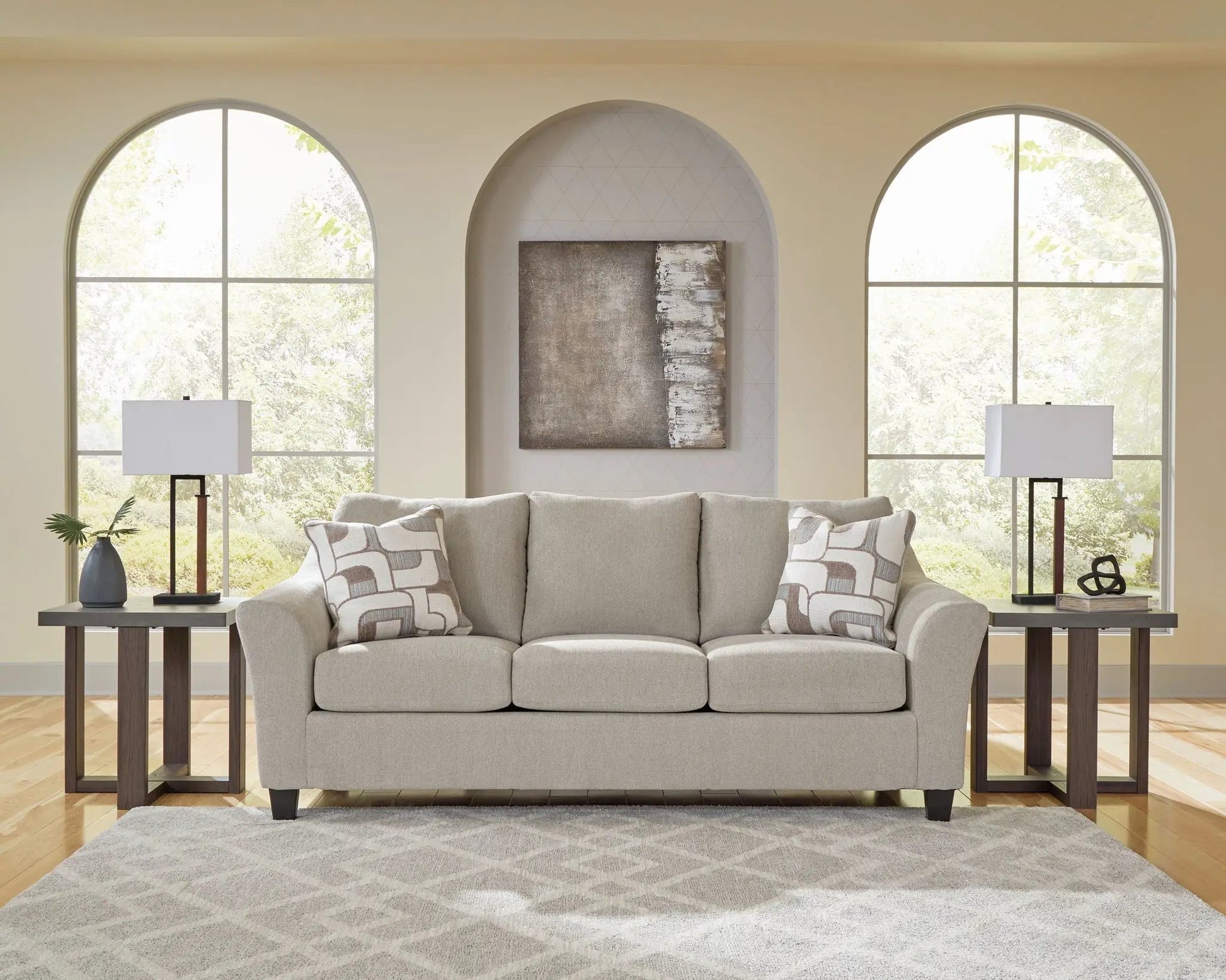 Willarae taupe sofa by Unique Piece Furniture in a modern living room setup on Tampa Home & Garden Store