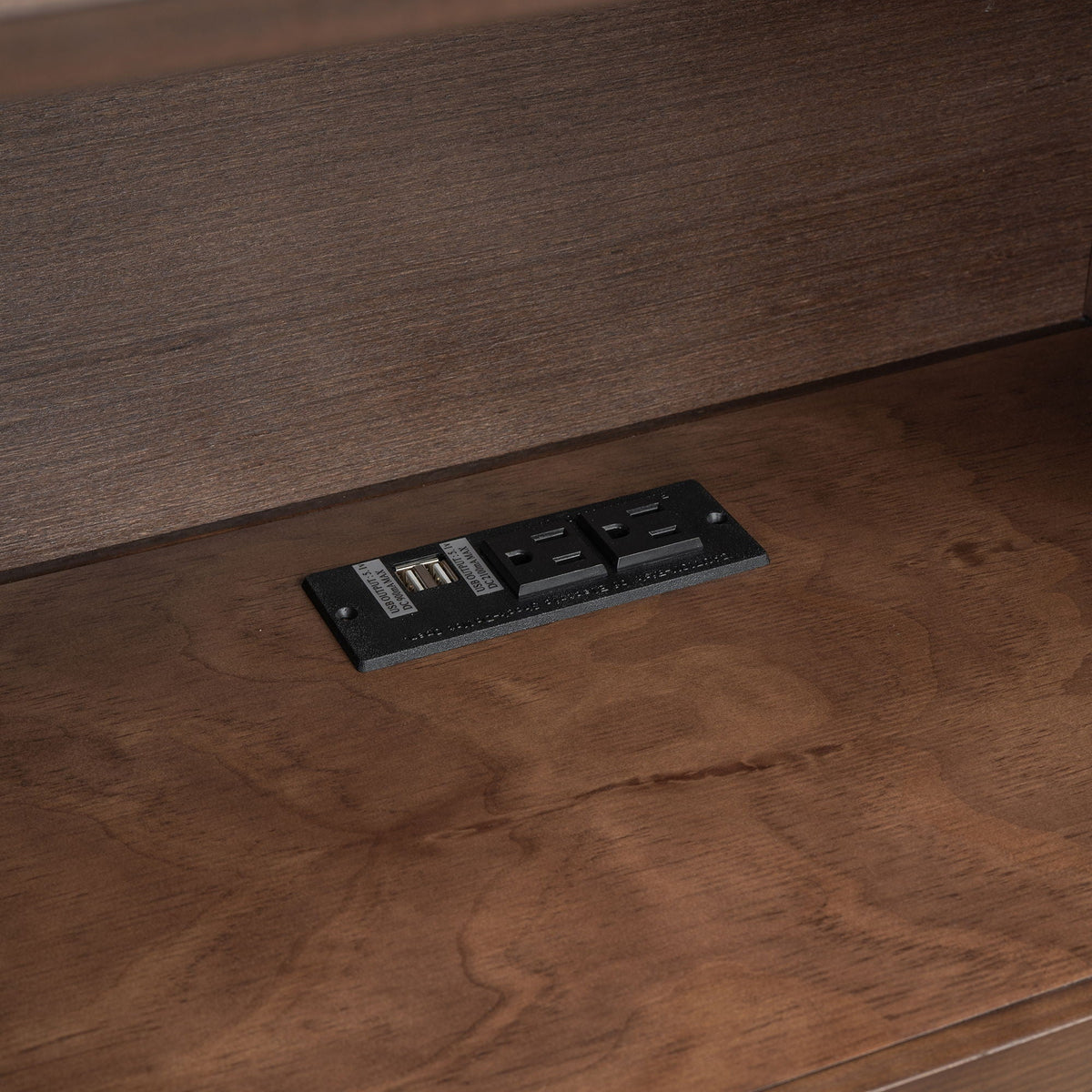 Storage platform bed frame in dark wood with integrated power outlet module on Tampa Home & Garden Store