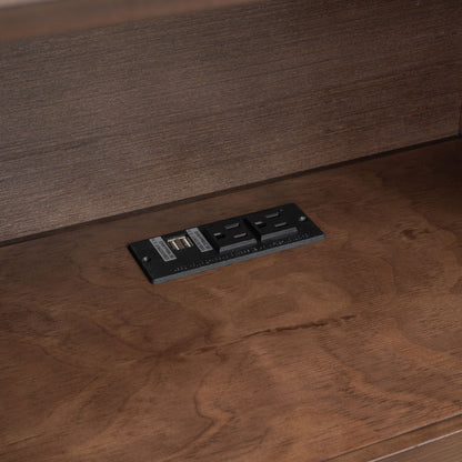 Storage platform bed frame in dark wood with integrated power outlet module on Tampa Home & Garden Store