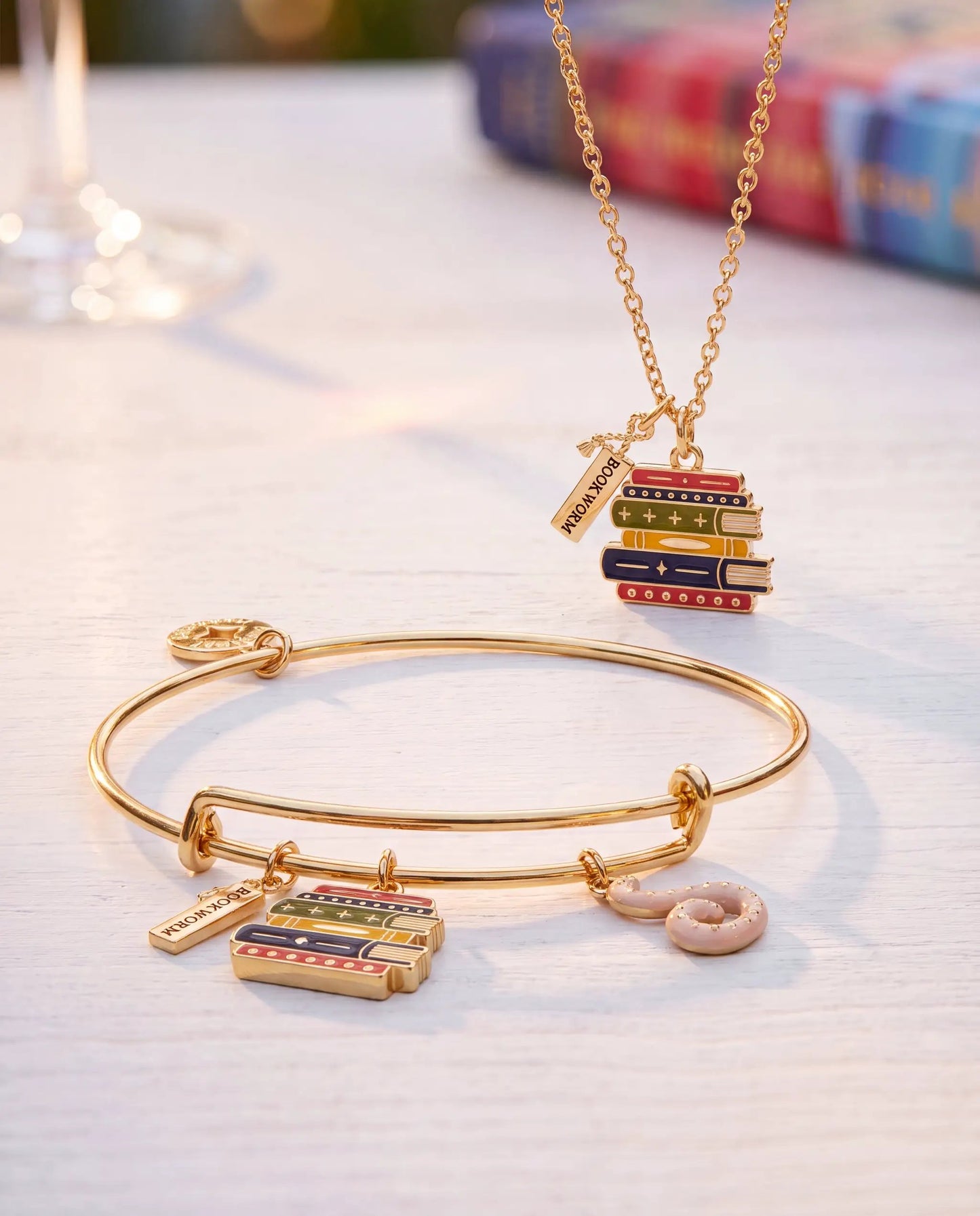 Book Club Multicharm Bangle with enamel book-stack charms and BOOKWORM tag on Tampa Home & Garden Store