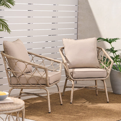 Bruce Outdoor Club Chair Set with water resistant cushions, two beige wicker chairs on a rug on Tampa Home & Garden Store