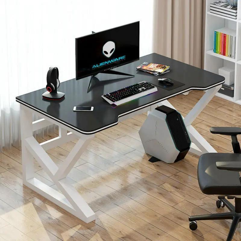 Computer desk with black top and white legs, Alienware monitor, keyboard, mouse, PC tower on Tampa Home & Garden Store