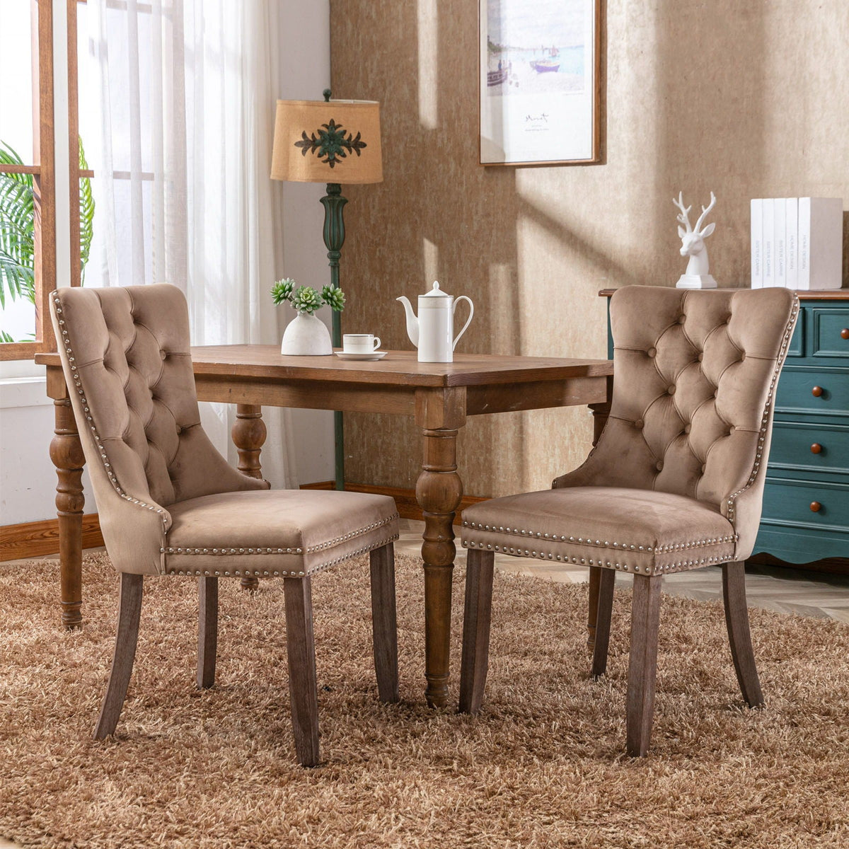 Tufted velvet dining chairs set with nailhead trim in beige, wood legs by HouseOfZazla on Tampa Home & Garden Store