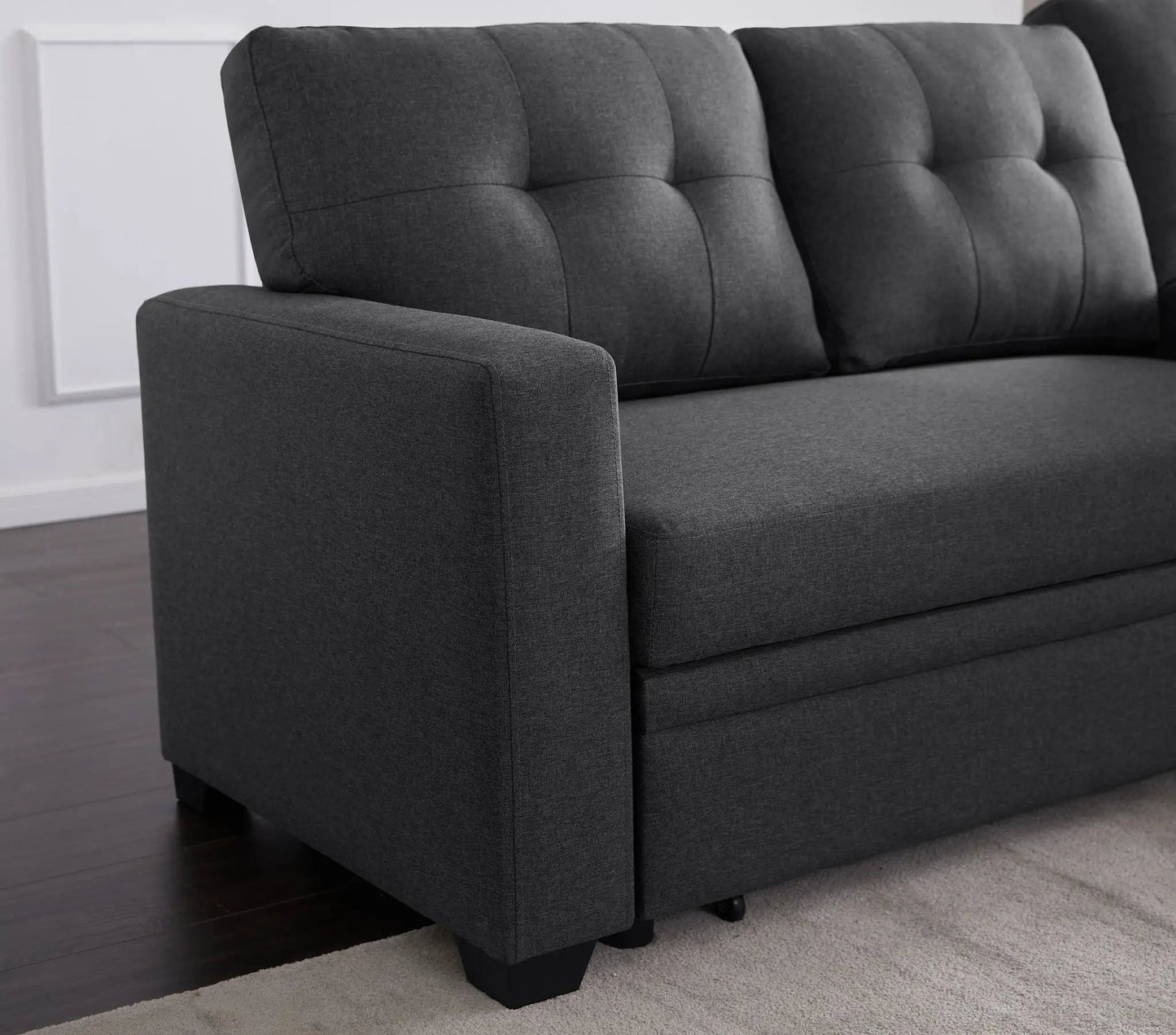 Upholstered pull-out sleeper sectional with chaise in dark gray fabric on Tampa Home & Garden Store
