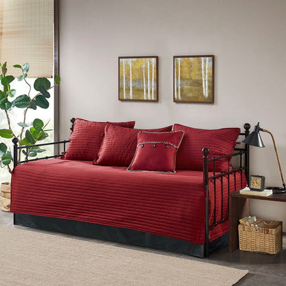 6 Piece Red Quilted Daybed Cover Set with matching shams on a black metal daybed on Tampa Home & Garden Store