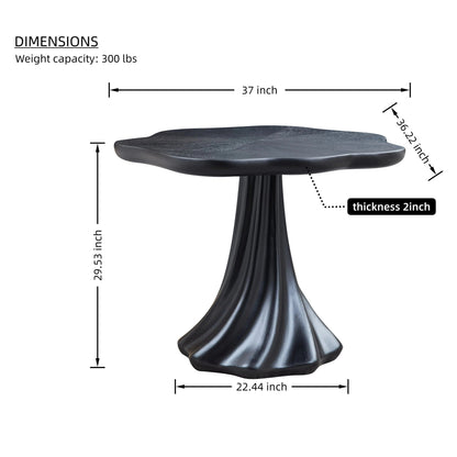 Sculptural round dining table with petal-shaped black top and textured pedestal HouseOfZazla on Tampa Home & Garden Store