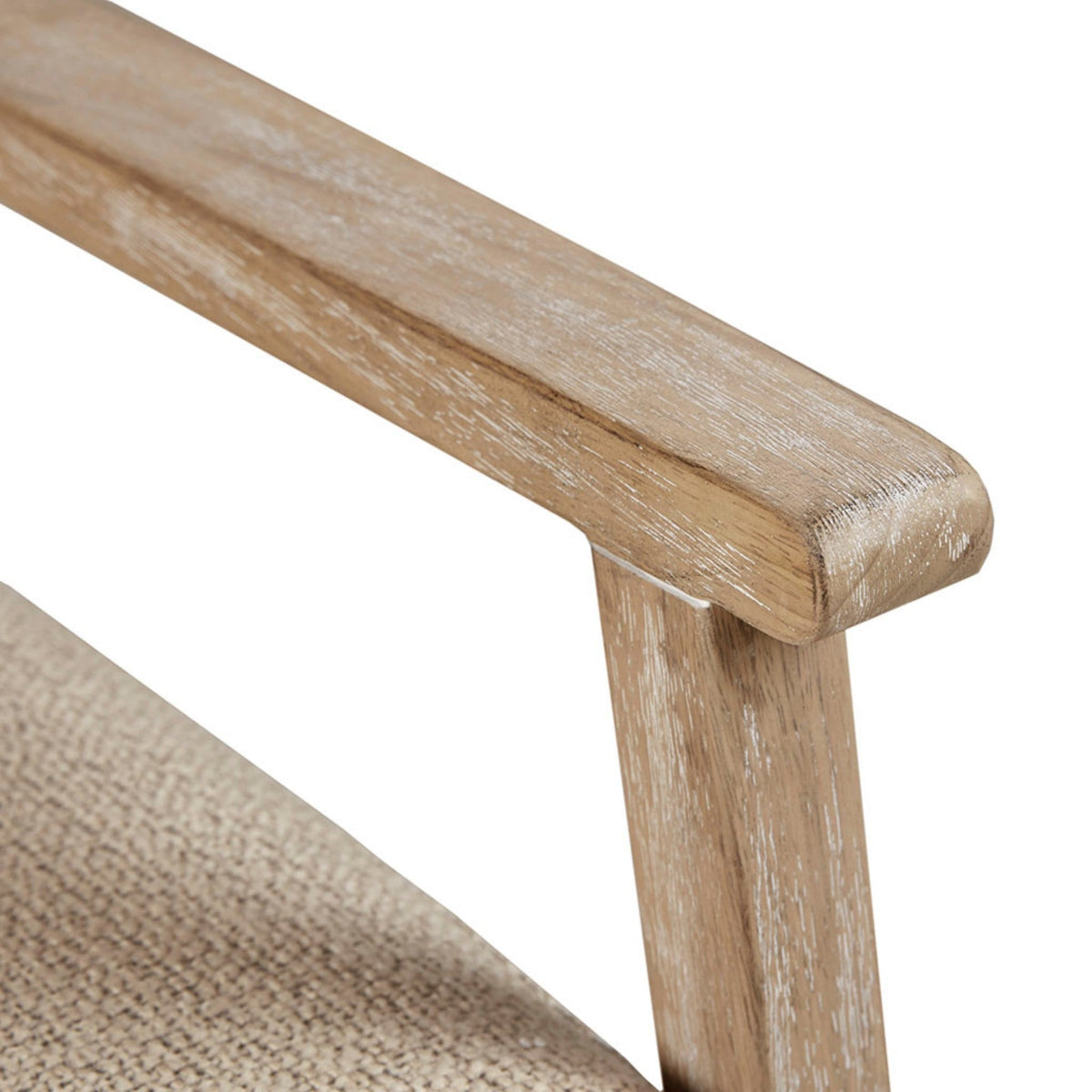 Natural wood armrest and leg of a Cane Back Upholstered Accent Chair with distressed finish on Tampa Home & Garden Store
