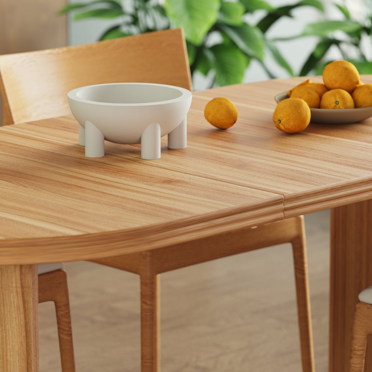 Modern extendable dining table in warm oak finish with removable leaves on Tampa Home & Garden Store