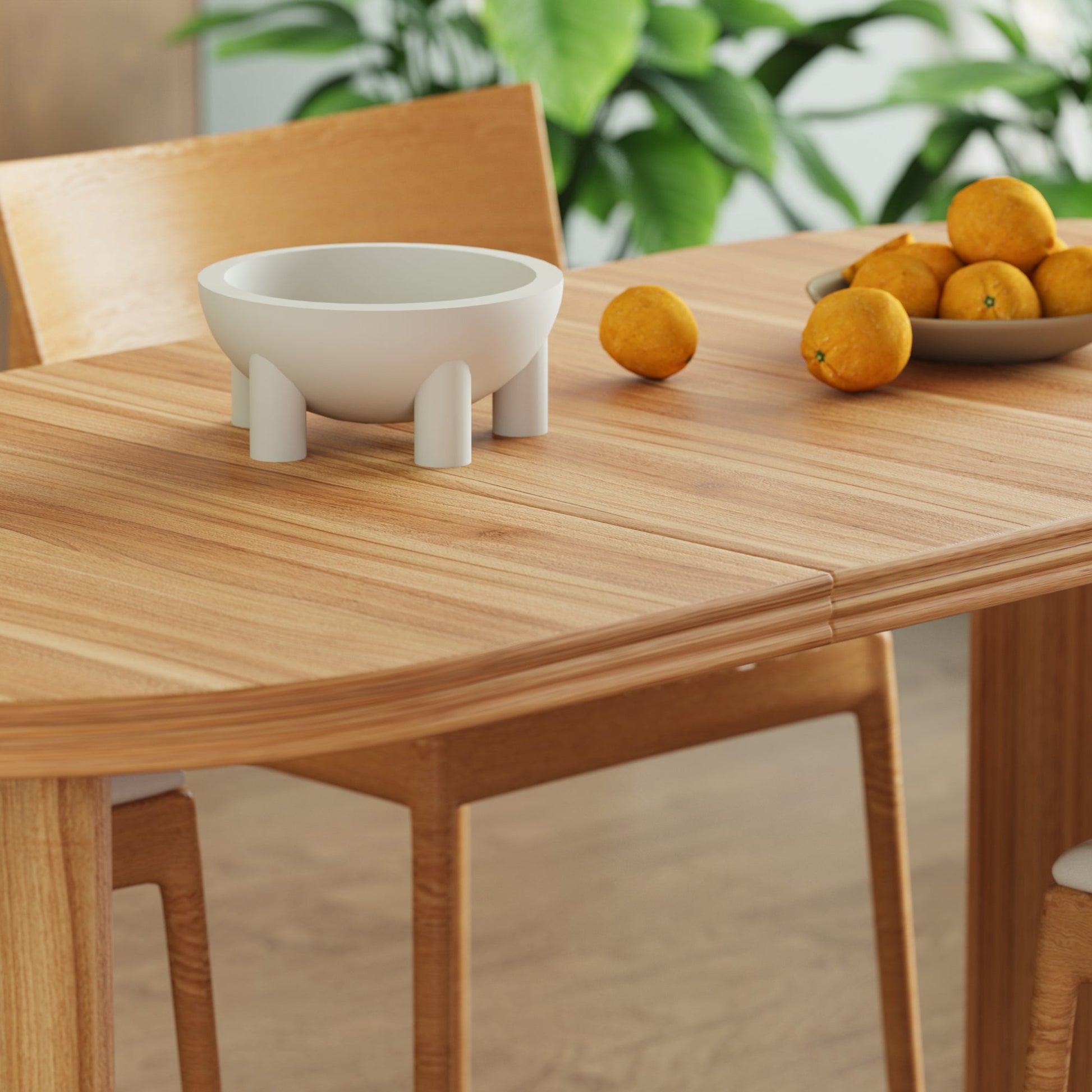 Modern extendable dining table in warm oak finish with removable leaves on Tampa Home & Garden Store