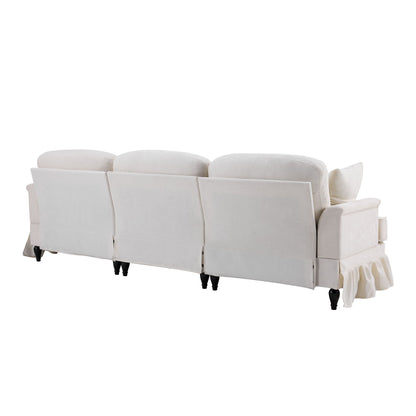 L-Shaped sectional sofa with removable ruffled skirt in white with flared arms and ottoman on Tampa Home & Garden Store