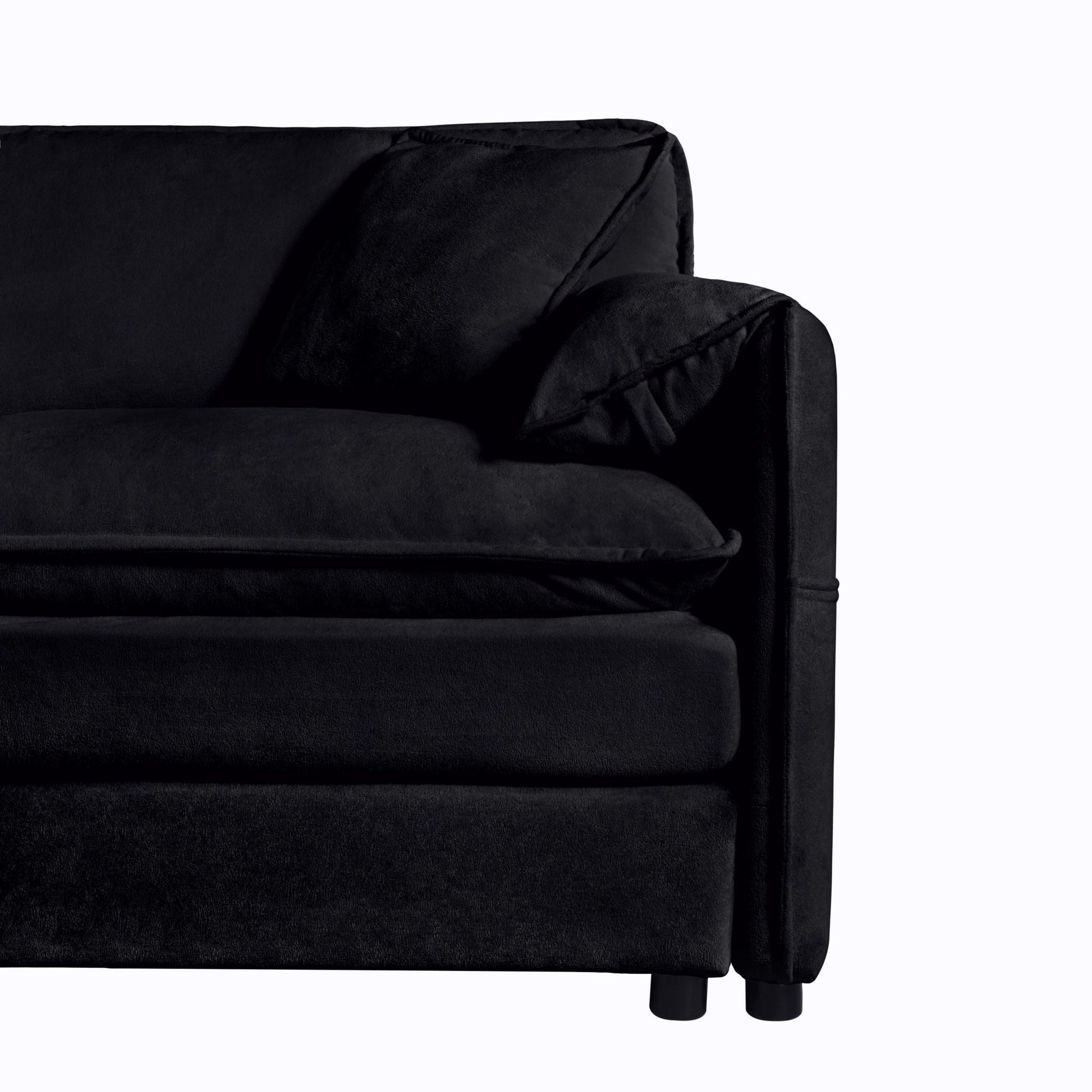 Modular sectional sofa in plush black velvet with deep seat cushions and padded arm on Tampa Home & Garden Store