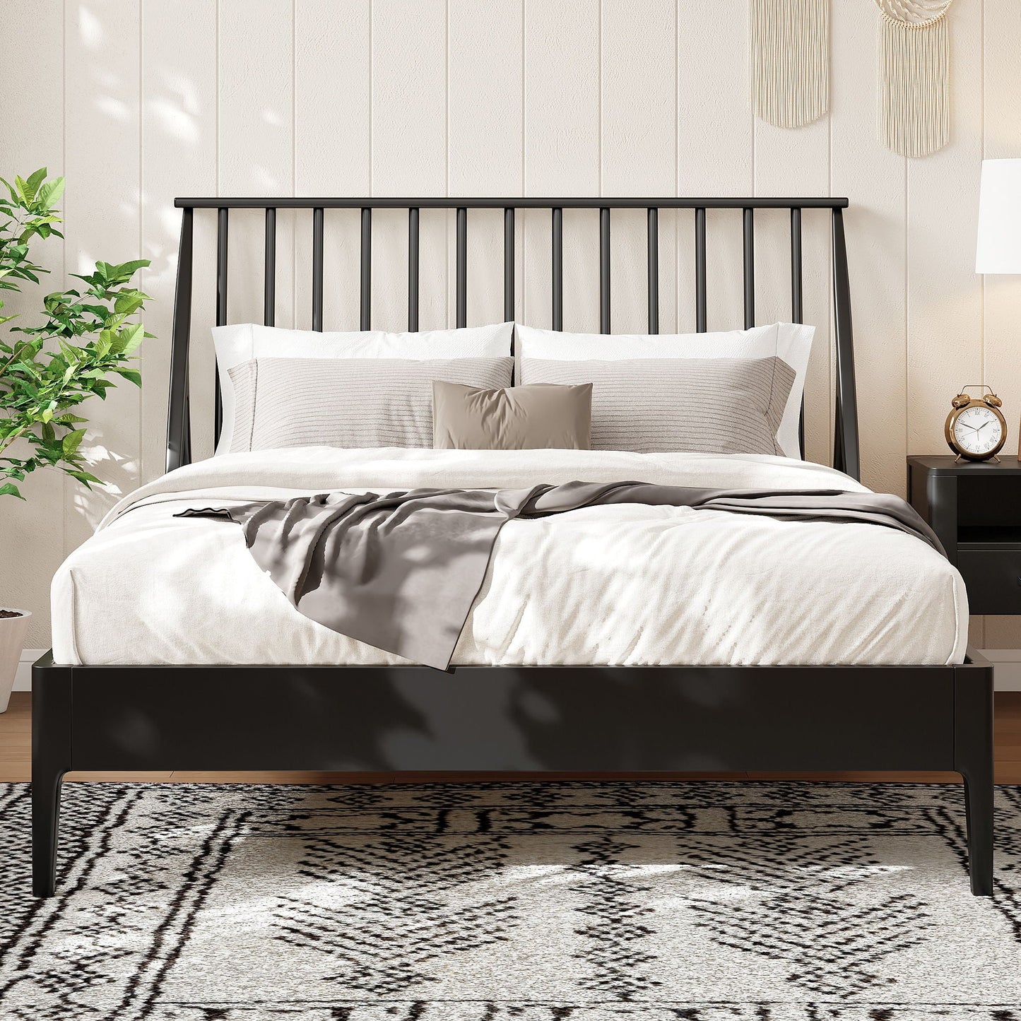 Bohemian platform bed with tall black metal headboard, white bedding and two pillows on Tampa Home & Garden Store