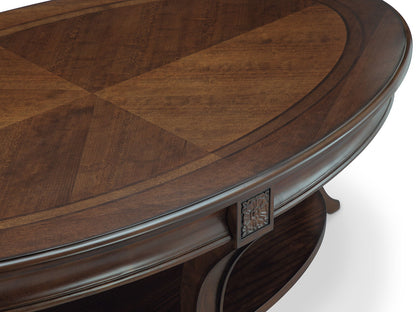 Winslet oval table by Unique Piece Furniture in dark wood checker veneer and carved apron on Tampa Home & Garden Store