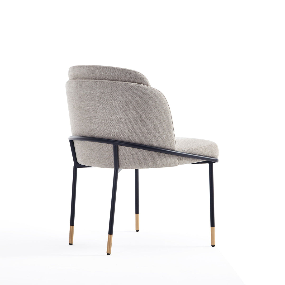 Flor Dining Chairs with twill weave beige upholstery, black metal frames and wood-tipped legs on Tampa Home & Garden Store