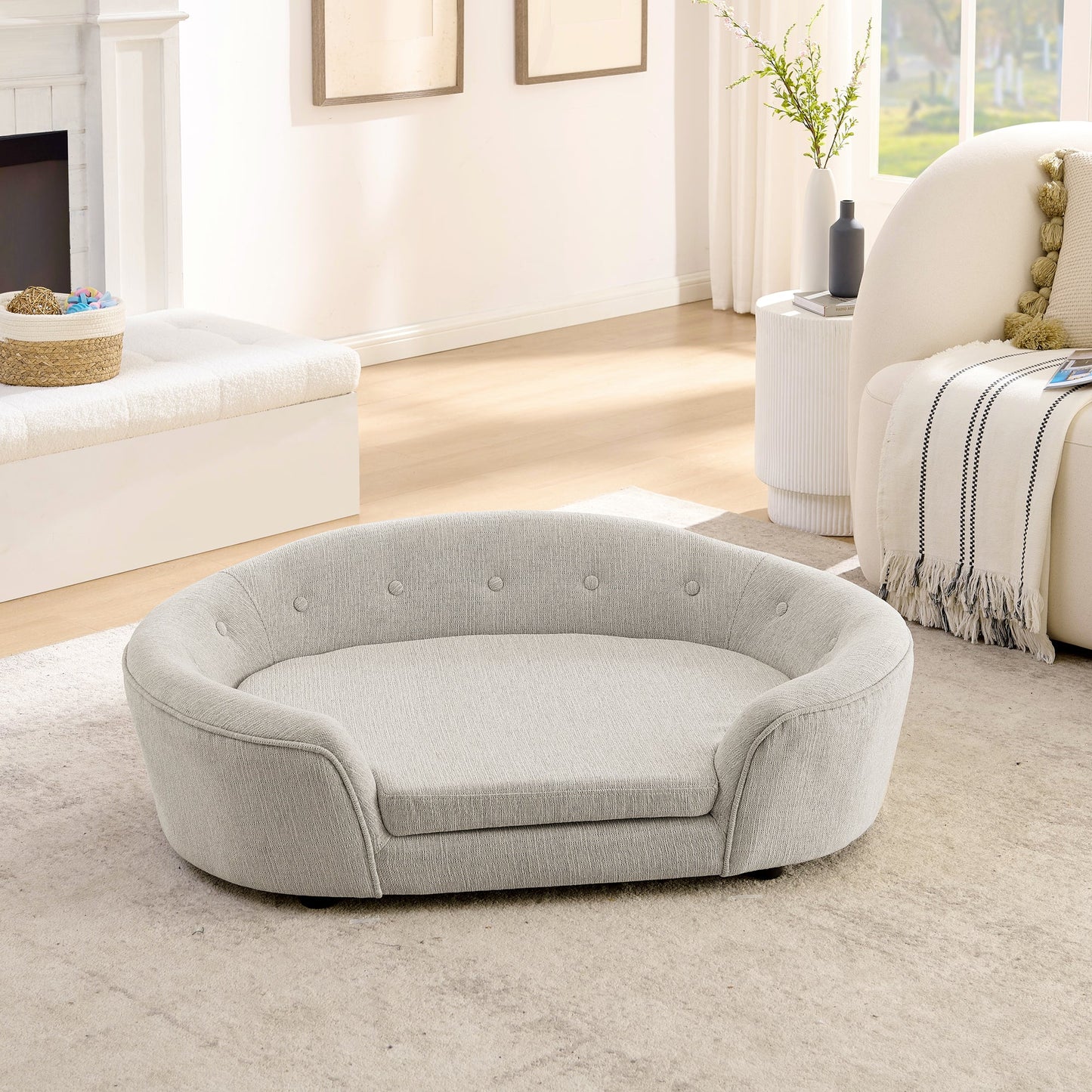 Oversized oval semi-enclosed dog sofa in beige linen with button tufted back on Tampa Home & Garden Store