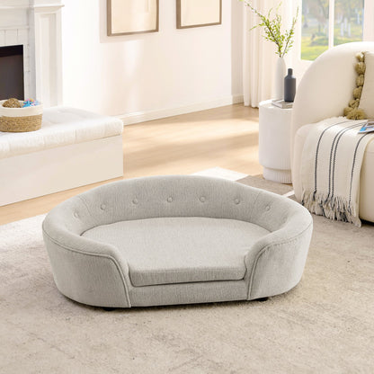 Oversized oval semi-enclosed dog sofa in beige linen with button tufted back on Tampa Home & Garden Store