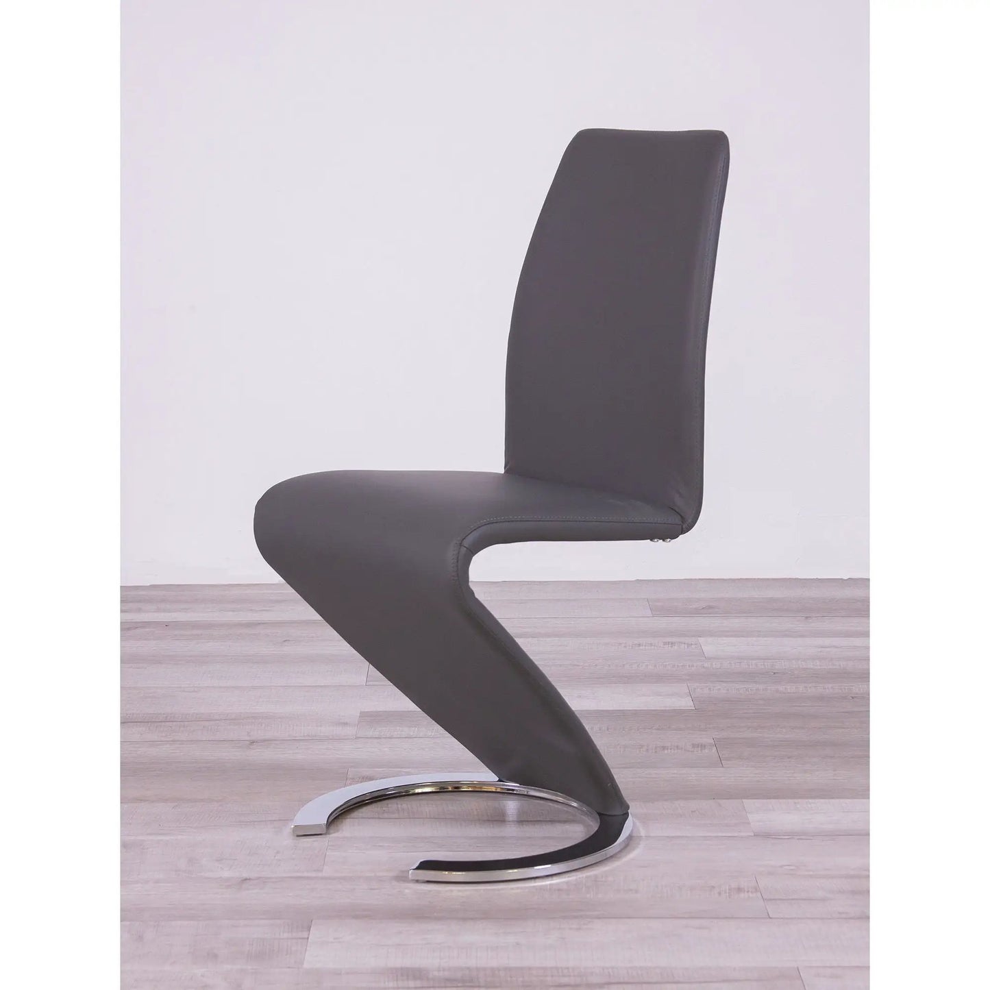Marcus Horseshoe Dining Chair gray faux leather with chrome base on Tampa Home & Garden Store on Tampa Home & Garden Store