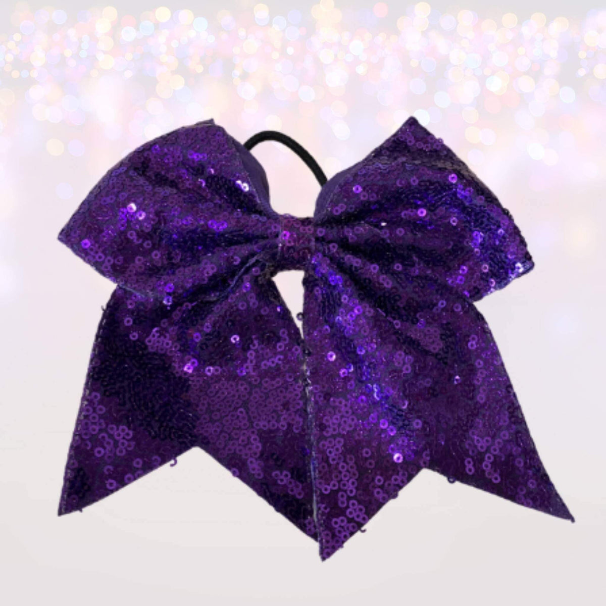 7 inch purple sequin cheer bows pair on a ponytail holder on Tampa Home & Garden Store