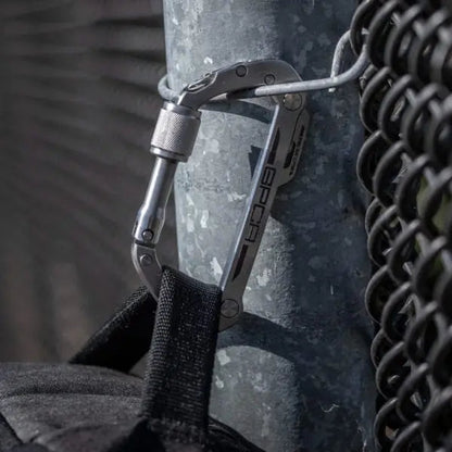 GPCA Carabiner PRO EDC multi-tool clip in metallic silver attached to a black strap on Tampa Home & Garden Store