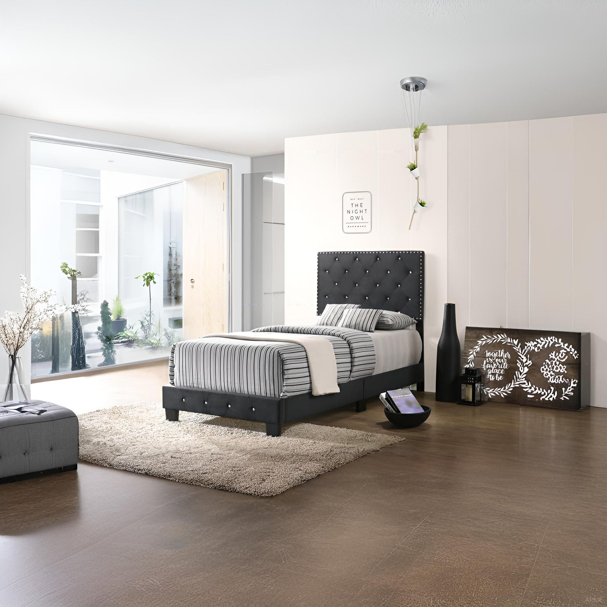 Luxurious Upholstered Bed with dark tufted headboard and striped bedding in modern bedroom on Tampa Home & Garden Store
