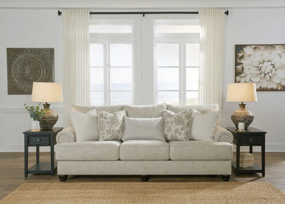Asanti sofa fog, beige fabric stationary sofa with patterned pillows on Tampa Home & Garden Store