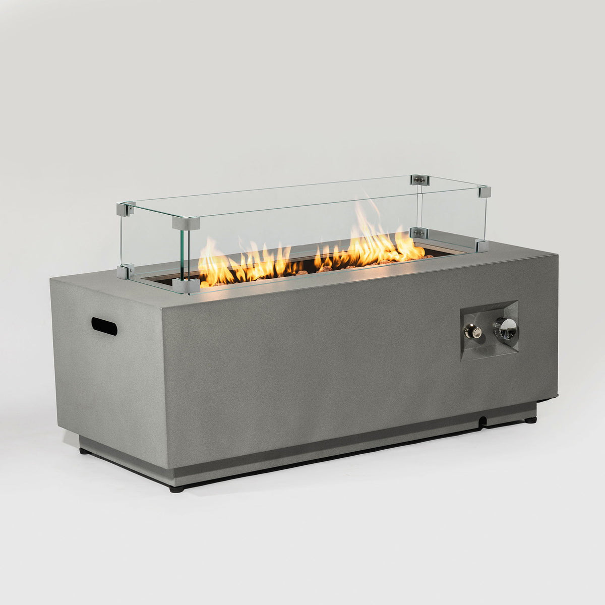 Propane gas fire pit table with glass wind guard in gray metal base showing bright flames on Tampa Home & Garden Store