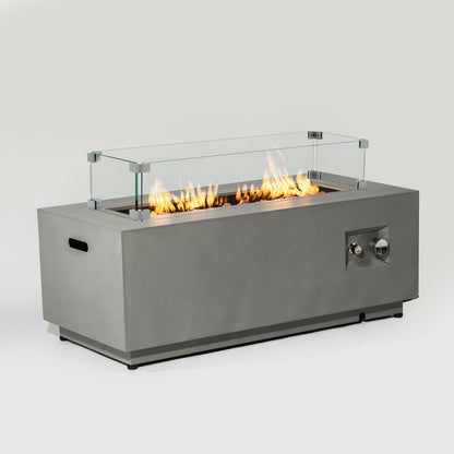 Propane gas fire pit table with glass wind guard in gray metal base showing bright flames on Tampa Home & Garden Store