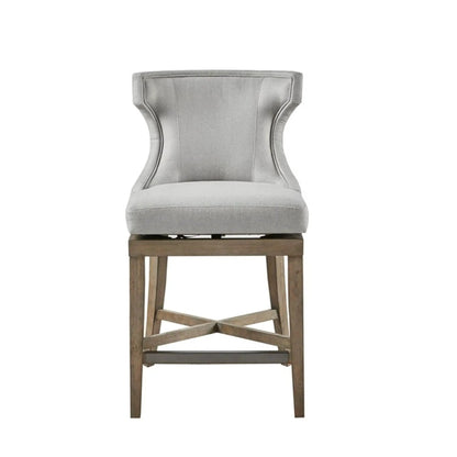 Carson Counter Stool with Swivel Seat in gray velvet upholstery with wooden legs on Tampa Home & Garden Store