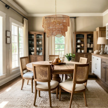 Handwoven paper rattan boho chandelier with 7-light E26 base hanging over round dining table on Tampa Home & Garden Store