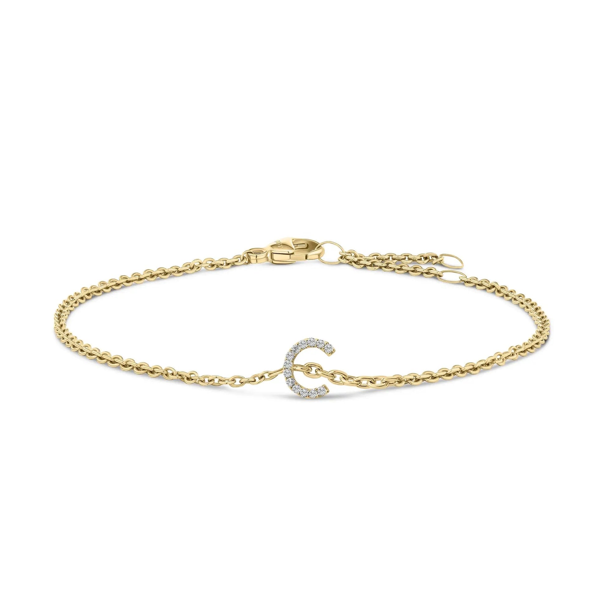 Gold-tone chain bracelet with a pavé diamond A initial charm and lobster clasp on Tampa Home & Garden Store