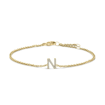 10K white gold link bracelet with a diamond-studded N initial charm on a gold chain on Tampa Home & Garden Store