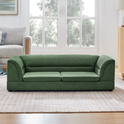 Oversized pet sofa with curved armrests in green upholstery, two sofas in living room on Tampa Home & Garden Store