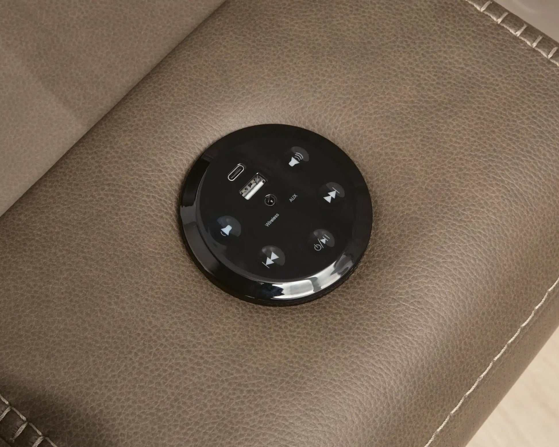 Max-Momentum reclining sectional round control hub with USB port on brown leather upholstery on Tampa Home & Garden Store