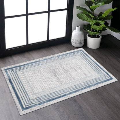 Marfi bordered area rug blue and cream border by Unique Piece Furniture on Tampa Home & Garden Store