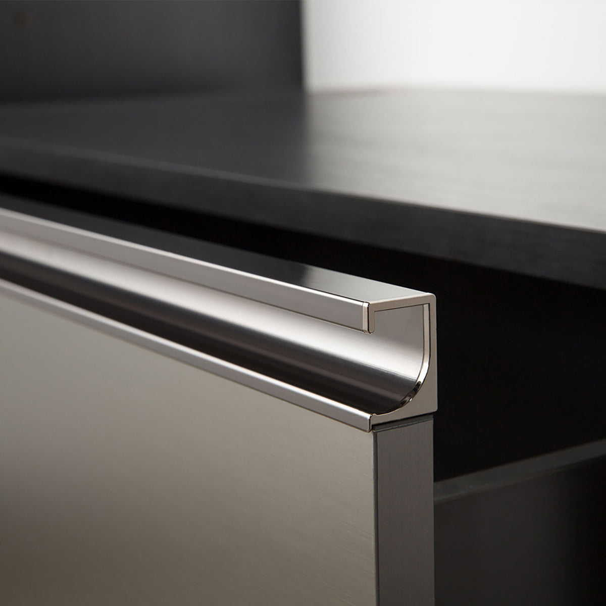 Wall mounted garage cabinet drawer in dark gray with brushed metal handle on Tampa Home & Garden Store