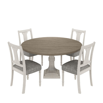 Round dining table set with pedestal base in gray wood, whitewashed chairs with cushions on Tampa Home & Garden Store
