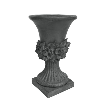 MGO Garden Urn Planter in dark stone with floral rosettes around the neck and a fluted pedestal base on Tampa Home & Garden Store