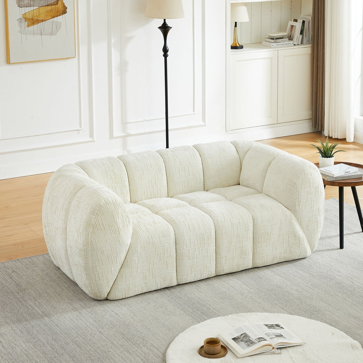 Rounded Cloud Sofa and Piano Key Backrest Design