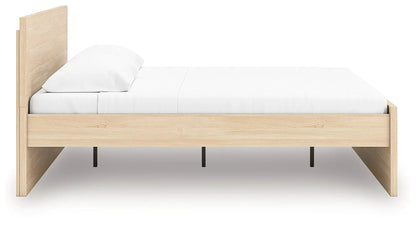 Onita panel platform bed natural oak finish with white bedding on Tampa Home & Garden Store