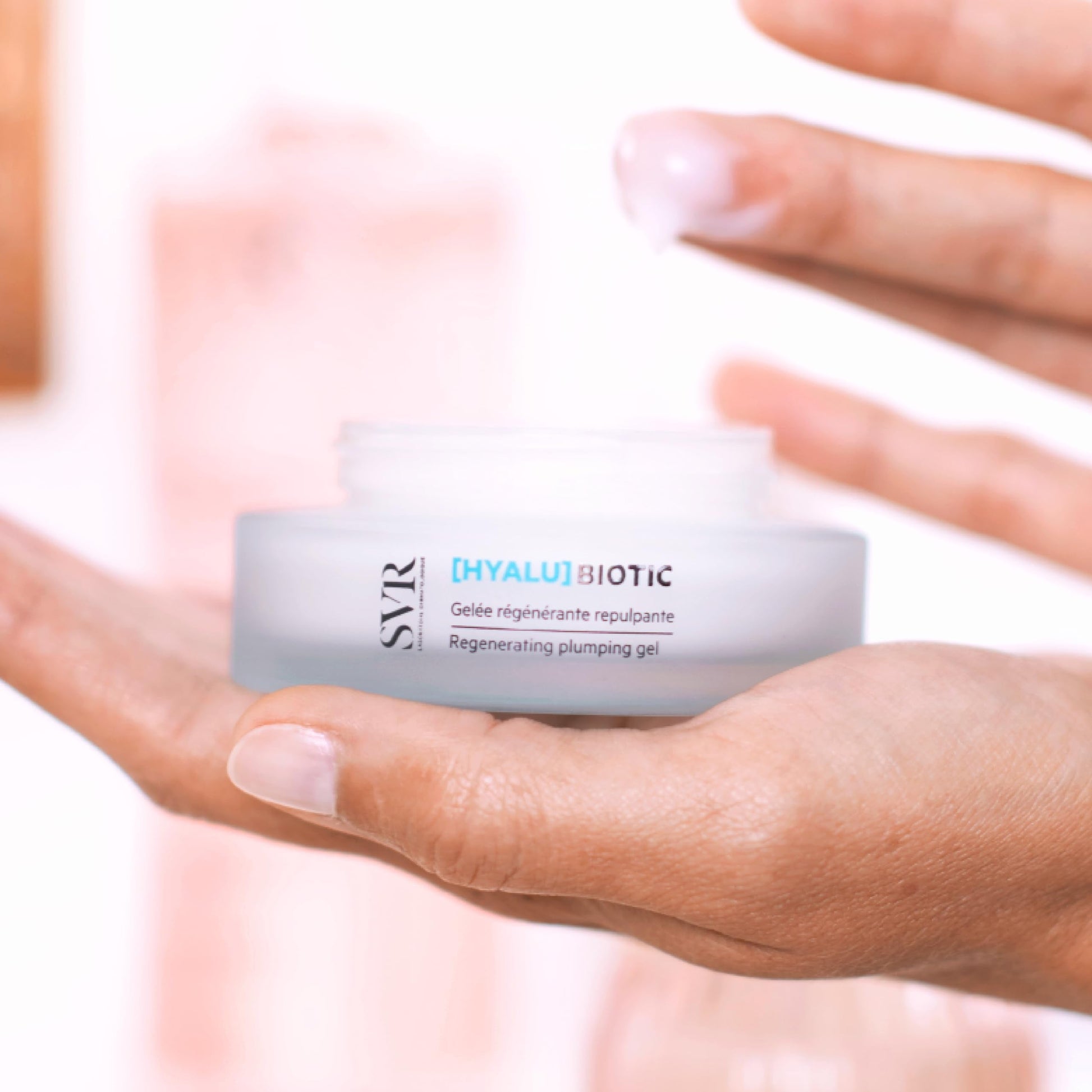 SVR Hyalu Biotic regenerating plumping gel in a silver-lid jar held in hands on Tampa Home & Garden Store