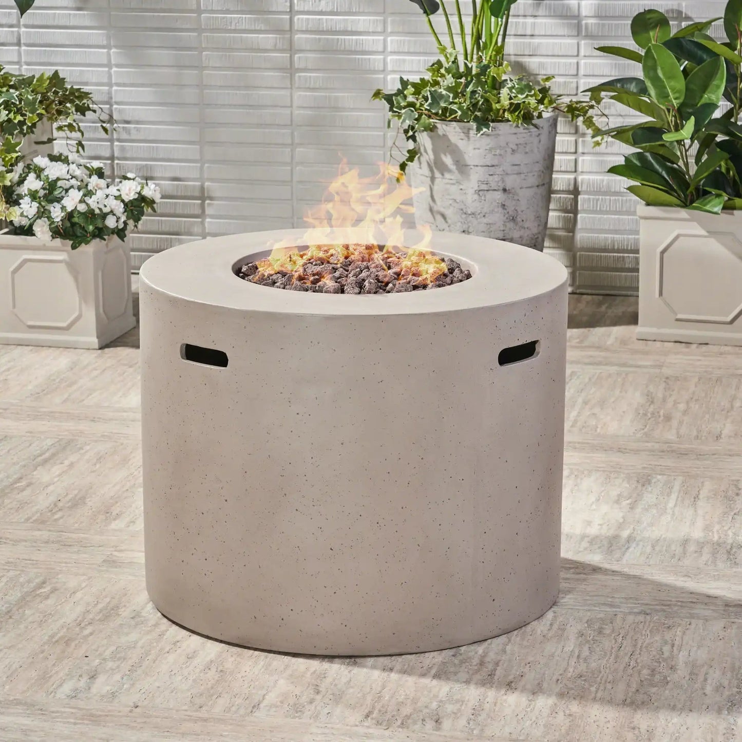 Round iron fire pit with 40,000 Btu flame, lava rock bed, HouseOfZazla outdoor fireplace on Tampa Home & Garden Store